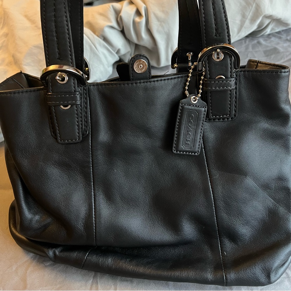 Black Coach Purse with light blue lining.